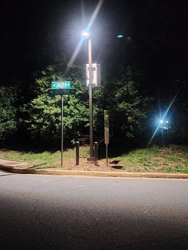 Parking lot lighting and security camera day